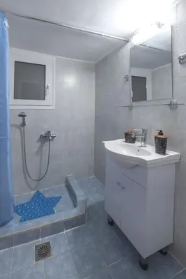 a bathroom with a shower and a sink and a shower at Your perfect choice for stay in Athens in Athens