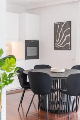 a dining room with a table and chairs at Athenian 3BR seaside property in Alimos by UPSTREET in Athens