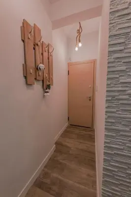 a hallway with a room with a door and a hallway at Design drop in Athens ' center in Athens