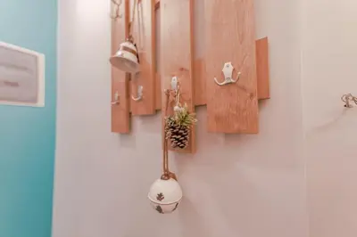 a wall with a vase with a plant in it at Design drop in Athens ' center in Athens
