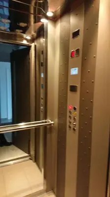 a elevator in a train with a wall with buttons at Top roof luxury studio near metro! in Athens