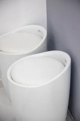 a bathroom with a white toilet and a bidet at Estia in Athens