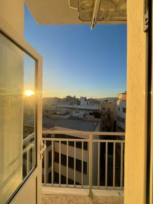 a view from the window of a balcony at Exarcheia Athens Penthouse in Athens