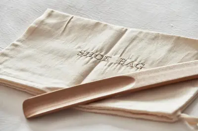 a brown spoon sitting on top of a white napkin at AthensWas Design Hotel in Athens