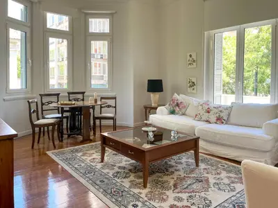 a living room with a couch and a table at Athens Center, Akadimias 77 - 1rst floor in Athens