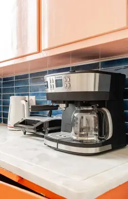 a kitchen counter with a mixer on a counter top at Athens City Center Gem-Acropolis View-Bright Spacious Flat in Athens