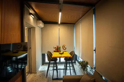 a small dining room with a table and chairs at athens guest in Athens