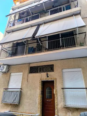 an apartment building with a balcony and a door at S-eva resort athens apartments in Athens