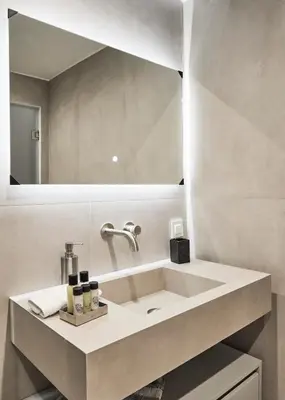 a bathroom with a sink and a large mirror at Bright space with street view, near Acropolis in Athens