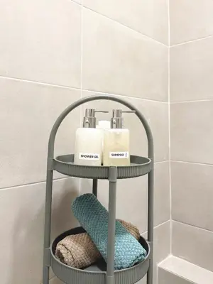 a towel rack with two towels on it in a bathroom at Cozy Aparthotel Pangrati in Athens