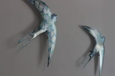 two birds flying in the sky at Urban-chic apartment in the heart of Athens in Athens