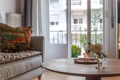 a living room with a coffee table and a couch at Timeless Athens Cozy Apartment in Athens