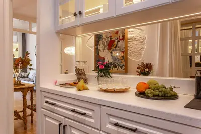 a kitchen counter with fruits and vegetables on it at Timeless Athens Cozy Apartment in Athens