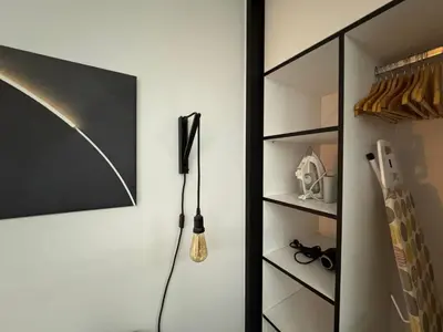 a room with a closet with at Modern Apartment with Free Parking and 300Mbps Internet in Athens