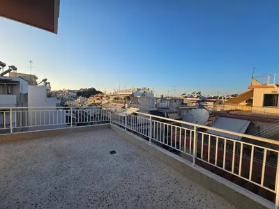 a balcony of a building with a view of a city at Casa d Irene - 5th Floor, Balcony Views, Metro Steps Away in Athens