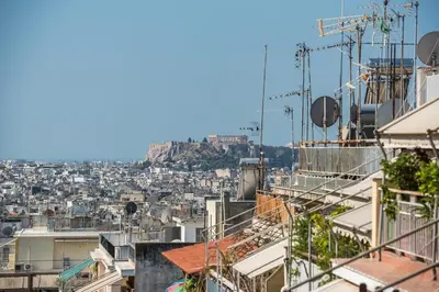 a view of a city with the acropolis at Chic penthouse with stunning view in Athens