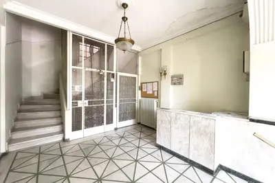 an empty hallway with a staircase and a room at Art & Comfort Apartment in Athens in Athens