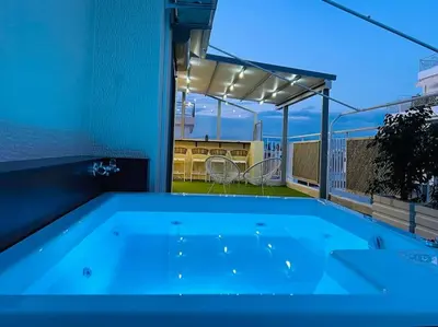 a swimming pool on the balcony of a house at The Penthouse Private Jacuzzi & Lycabettus View in Athens