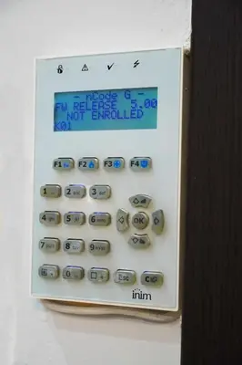 a machine with an electronic calculator on a wall at Athenian Petralona Suite near Athens City centre in Athens