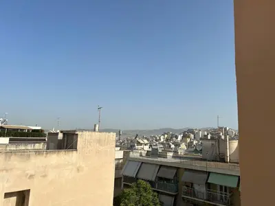 a view of a city from the top of a building at Cozy apartment in lycabettus hills in Athens