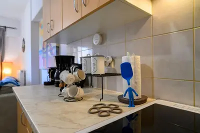 a kitchen with a counter top with various appliances at Premium Athenian District Urban 1 bedroom flat B in Athens