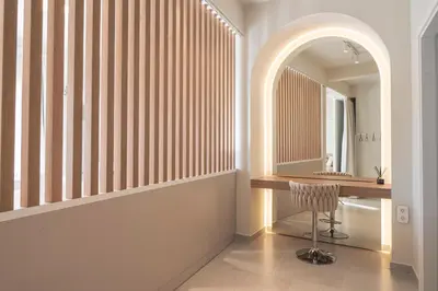 a dressing room with a desk and a mirror at Oculus Kallithea Creators Hub&Suite by Live&Travel in Athens