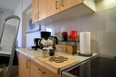 a kitchen with a counter with a stove top oven at Premium Athenian District Urban 1 bedroom Flat D in Athens