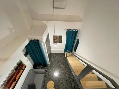 an overhead view of a staircase in a house at Ground floor appartment Panormou Metro in Athens