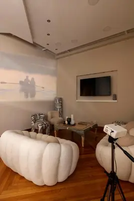 a living room with a couch and a tv at Kallirois Avenue House 7ppl 2BR Acropolis Metro Plaka 300m in Athens