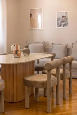 a dining room with a table and chairs at Kallirois Avenue House 7ppl 2BR Acropolis Metro Plaka 300m in Athens