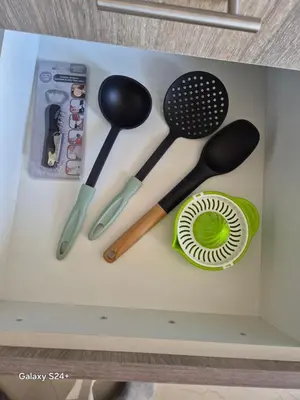 a box with some kitchen utensils in it at Lavender-Dalia cosy apartment center of Athens in Athens