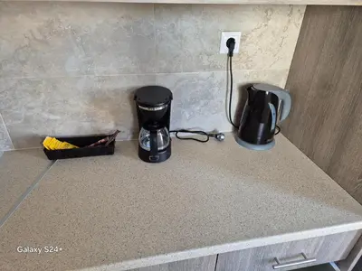 a counter top with a coffee maker and a blender at Lavender-Dalia cosy apartment center of Athens in Athens