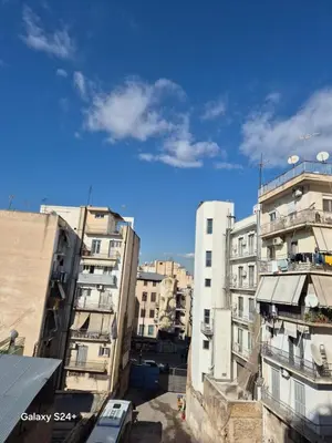 a group of tall buildings in a city at Lavender-Dalia cosy apartment center of Athens in Athens