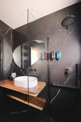 a bathroom with a sink and a mirror at Tyto Alba Habitat in Athens