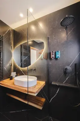 a bathroom with a sink and a mirror at Tyto Alba Habitat in Athens