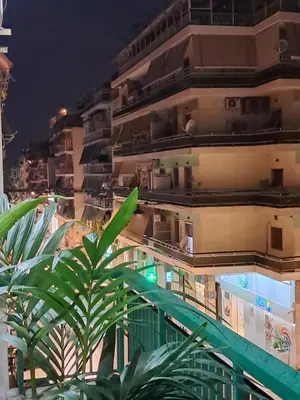 a view of a building at night at Artemis ktparadise in Athens