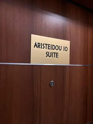 a sign on a door that reads antetheastern io suite at Family Suite by Zeussuites in Athens