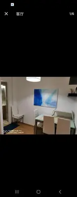 a dining room with a table and two chairs at \u4f18\u5f02\u7684\u5730\u94c1\u65c1\u516c\u5bd3 in Athens