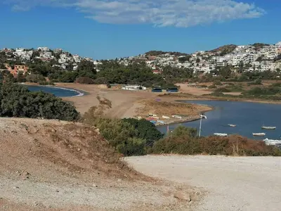 a view of a beach and a body of water at Sea View Serenity in Athens in Anavissos