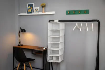 a room with a desk and a shelf at ERMES 2-BD Retreat with Acropolis view in Athens
