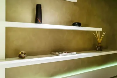 a white shelf with some items on it at Alia by GK Properties in Athens