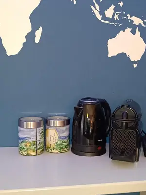 a coffee maker and a toaster on a counter at Plaka Hideaway Suite in Athens