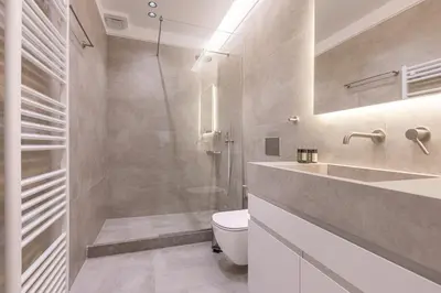 a bathroom with a toilet and a shower at Phaedrus Living Athens Luxury Residences Champagne in Athens