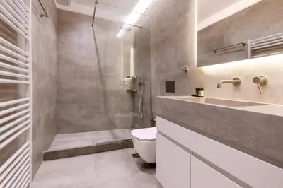 a bathroom with a sink and a toilet and a shower at Phaedrus Living Athens Luxury Residences Ivory in Athens