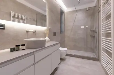 a bathroom with a sink and a toilet and a shower at Phaedrus Living Athens Luxury Residences Sands in Athens