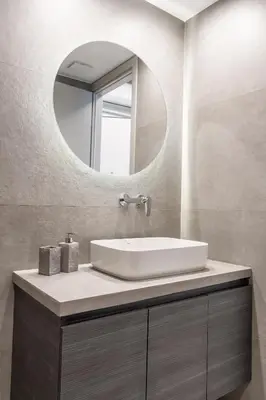 a bathroom with a sink and a mirror at EN Suites Stylish & Comfort Stay near Acropolis in Athens