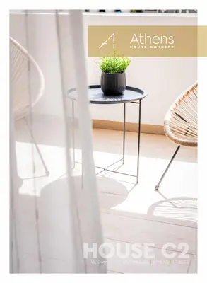 a plant sitting on a table in a room at Athens House Concept Apartments in Athens