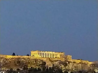 a building sitting on top of a cliff at Acropolis View Studio in Monastiraki in Athens