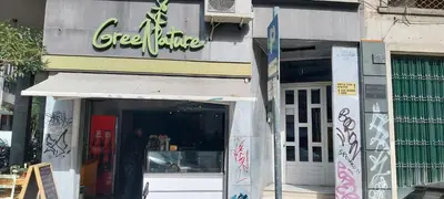 a store with a sign on the front of it at Acropolis View Studio in Monastiraki in Athens