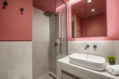 a bathroom with a sink and a shower at Lykavittos hill- penthouse in Athens